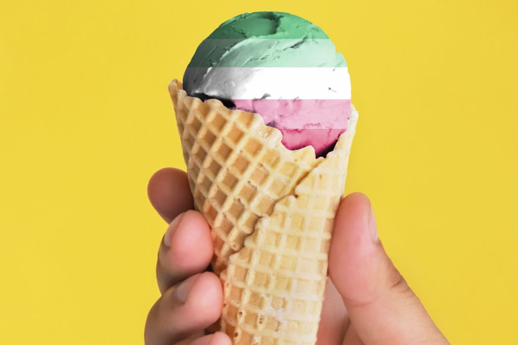 Waffle cone with a 5 color scoop of ice cream symbolizing the abrosexual flag.