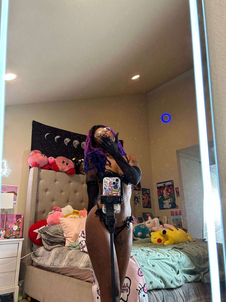 Master Celestress nude in black lingerie shooting new gooning content in her home studio